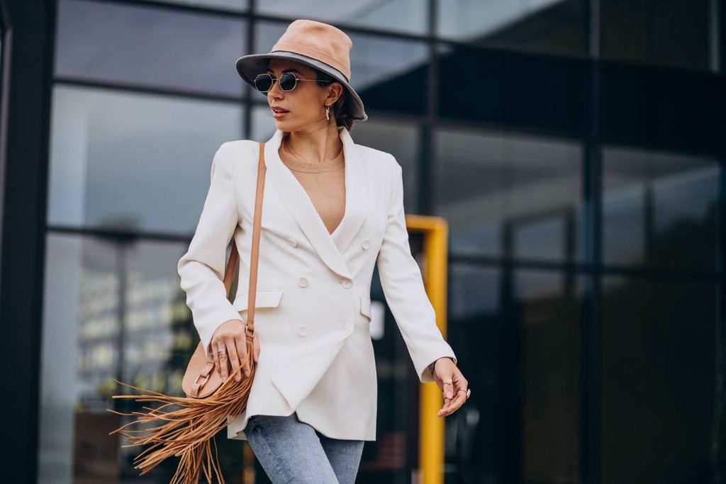 White Blazer with Jeans and Neutral Accessories