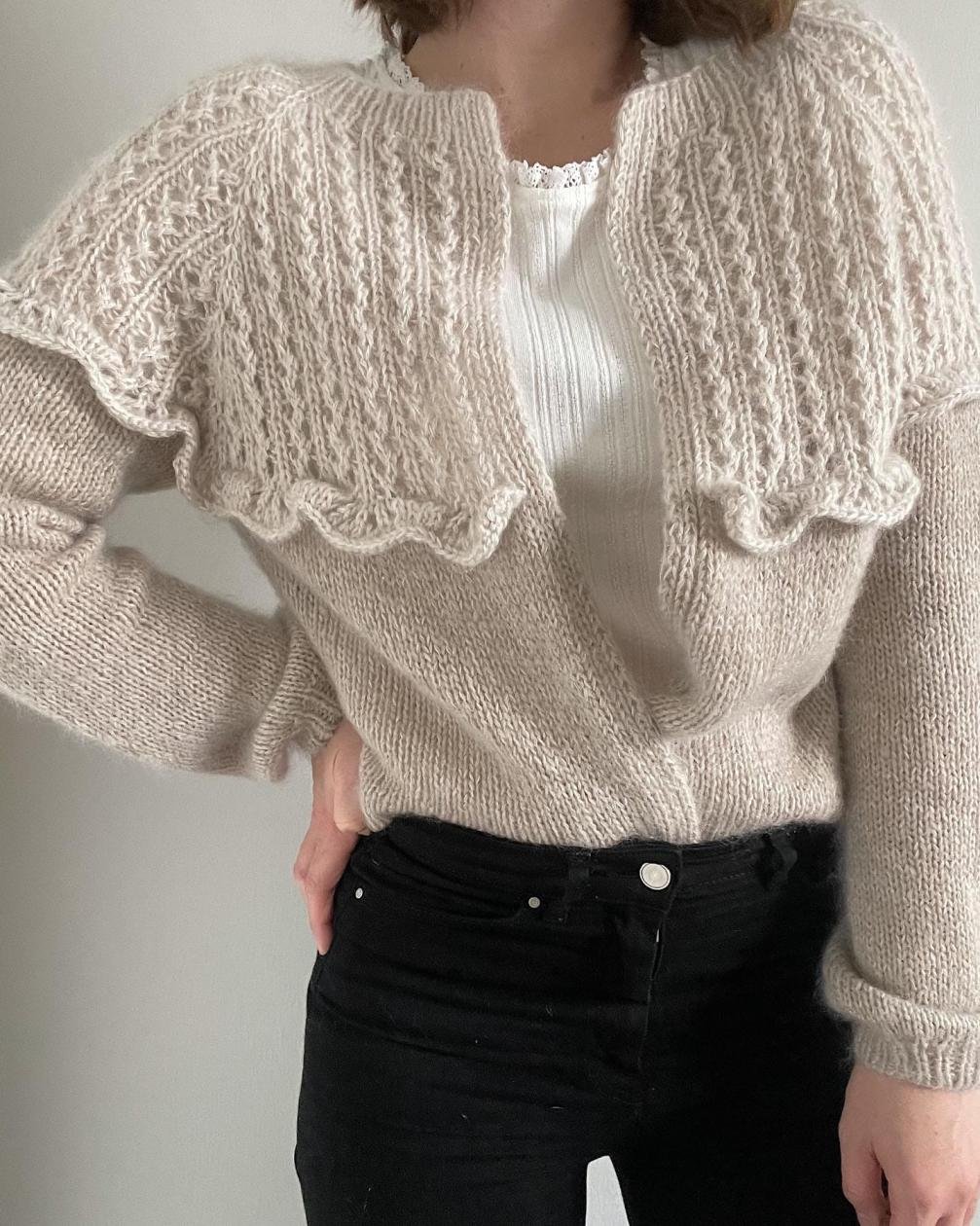 Style Black Jeans with a Cozy Cream