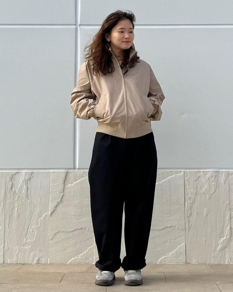 Neutral Jacket With Black Trousers and Sneakers